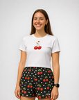 Woman wearing RF-Wear Women's Cherry Polka Dot Shorts in Black/White/Red