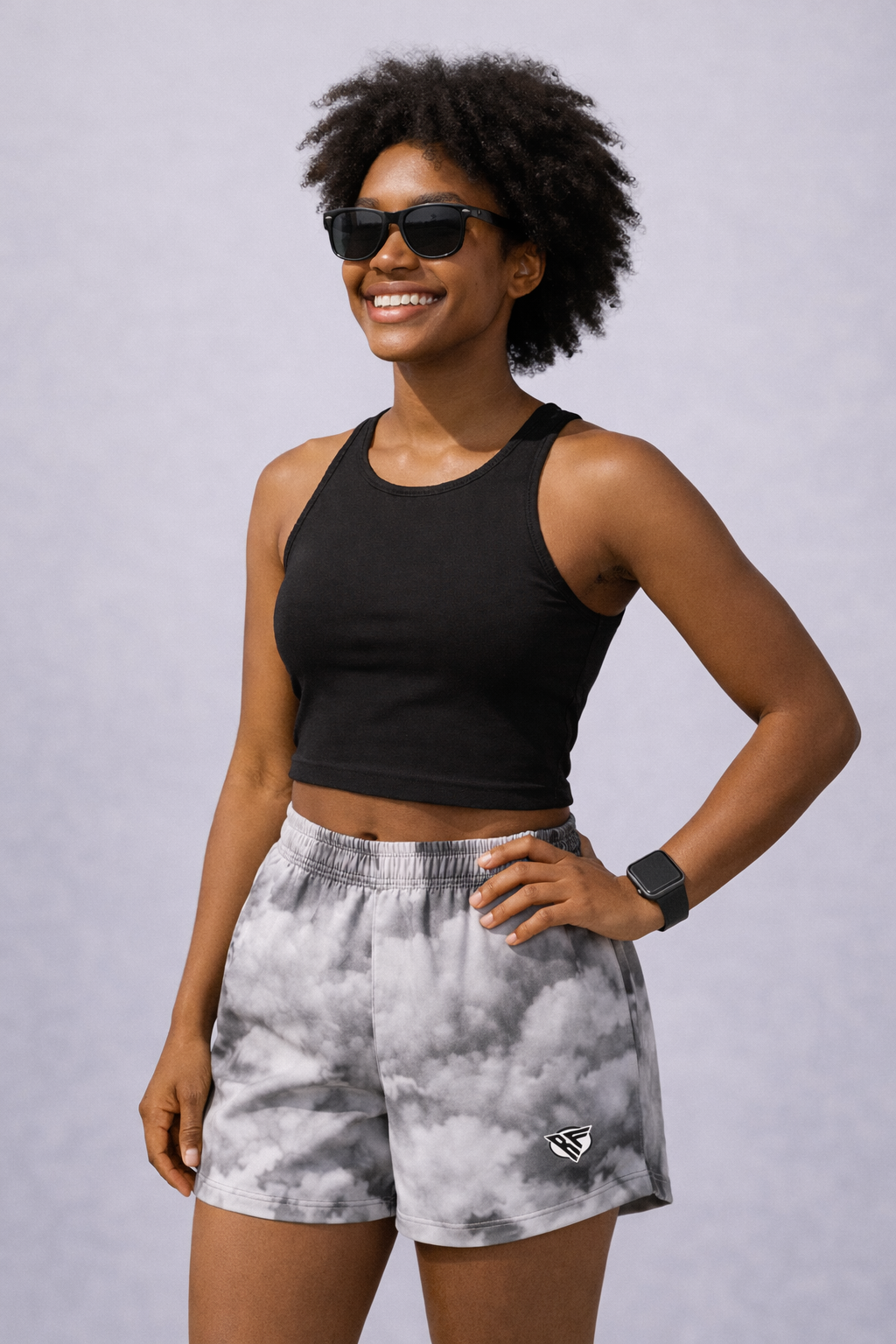 Woman wearing a black top and RF-Wear Women's Cloud Shorts in Grey