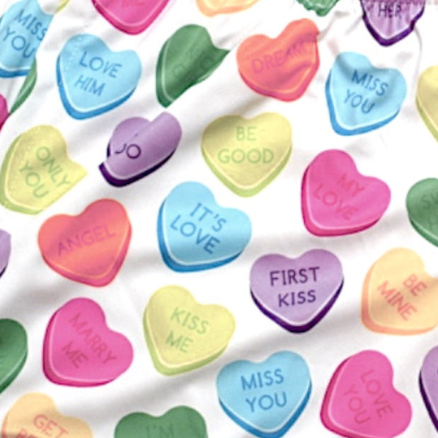 Close-up of RF-Wear Women's Convo Heart Split Shorts in Pink