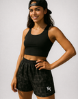 Woman wearing RF-Wear Women's Cross 2.0 Shorts in Black/Charcoal 