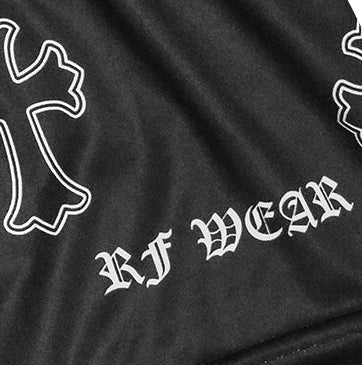 Close-up of RF-Wear Women's Cross 3.0 Shorts in Black/White with RF wear on hemline