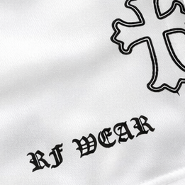 Close-up of RF-Wear Women's Cross 3.0 Shorts in White with RF WEAR logo