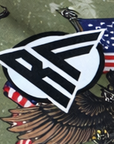 Close-up of RF-Wear Women's Eagle, Flags, Guns Shorts in Military Green with RF logo