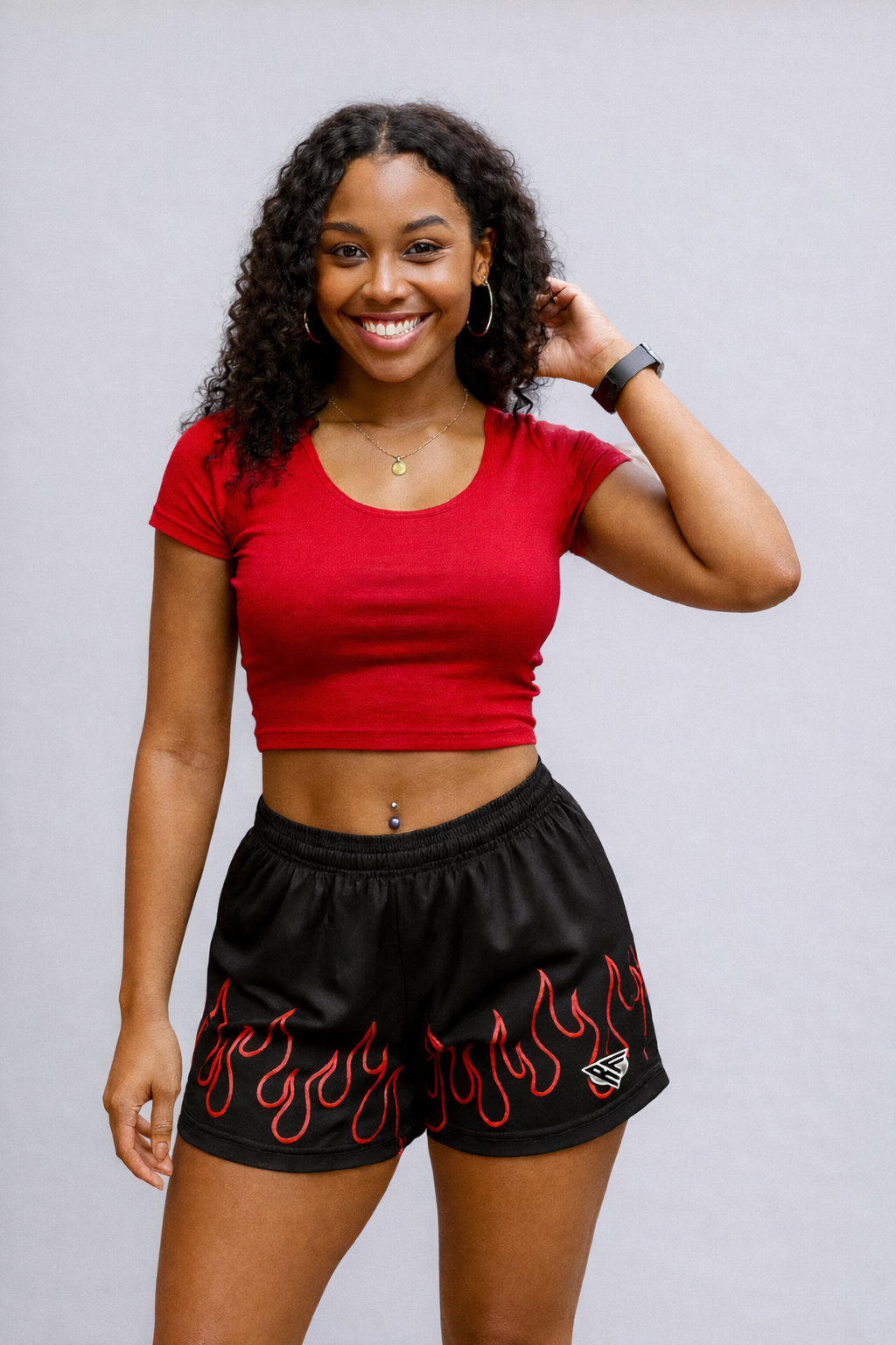 Woman wearing RF-Wear Women's Fire Shorts in Red