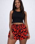 Woman wearing RF-Wear Women's Flame Shorts in Black/Red