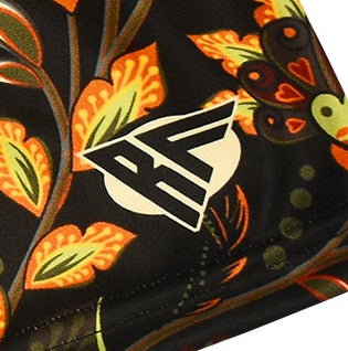 Close-up of RF-Wear Women's Floral 2.0 Shorts - Black/Yellow/Orange with RF logo