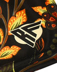 Close-up of RF-Wear Women's Floral 2.0 Shorts - Black/Yellow/Orange with RF logo