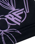 Close-up of RF-Wear Women's Floral Shorts - Black/Lavender with RF logo