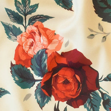 Close-up of RF-Wear Women's Floral Shorts in Cream/Red/Peach