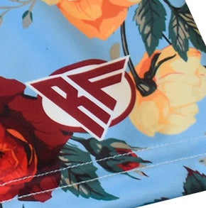 Close-up of RF-Wear Women's Floral Shorts in Sky-Blue/Multicolors with RF logo