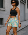 Woman Wearing RF-Wear Women's Floral Shorts in Teal/Multicolors