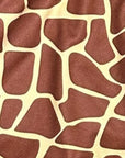 Close-up of RF-Wear Women's Animal Print Shorts - Giraffe in Brown/Yellow 