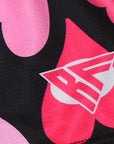 Close-up of RF-Wear Women's Heart Shorts in Black/Pink with RF logo