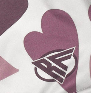 Close-up of RF-Wear Women's Heart Shorts in White/Purple with RF logo