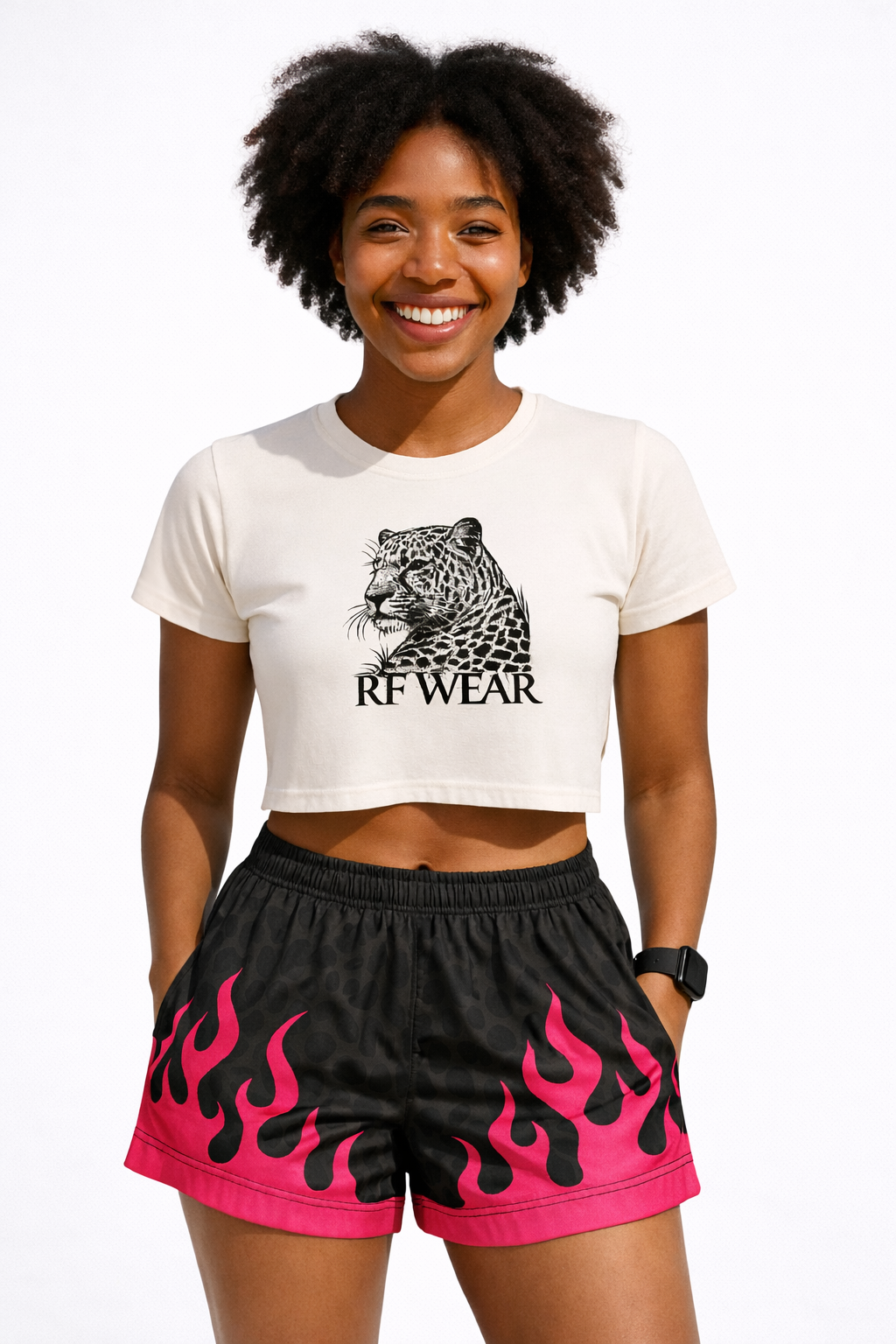 Woman wearing a white top and RF-Wear Women's Leopard Flame Shorts in Black/Grey with Fuchsia Flames 