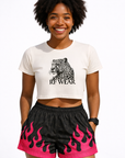 Woman wearing a white top and RF-Wear Women's Leopard Flame Shorts in Black/Grey with Fuchsia Flames 