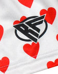 Close-up of RF-Wear Women's Mini Heart Shorts - White/Red with RF logo