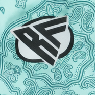 Close-up of RF-Wear Women's Mismatch Bandana Shorts in Teal with RF logo