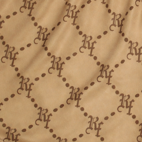 Close-up of RF-Wear Women's Monogram Shorts in Tan
