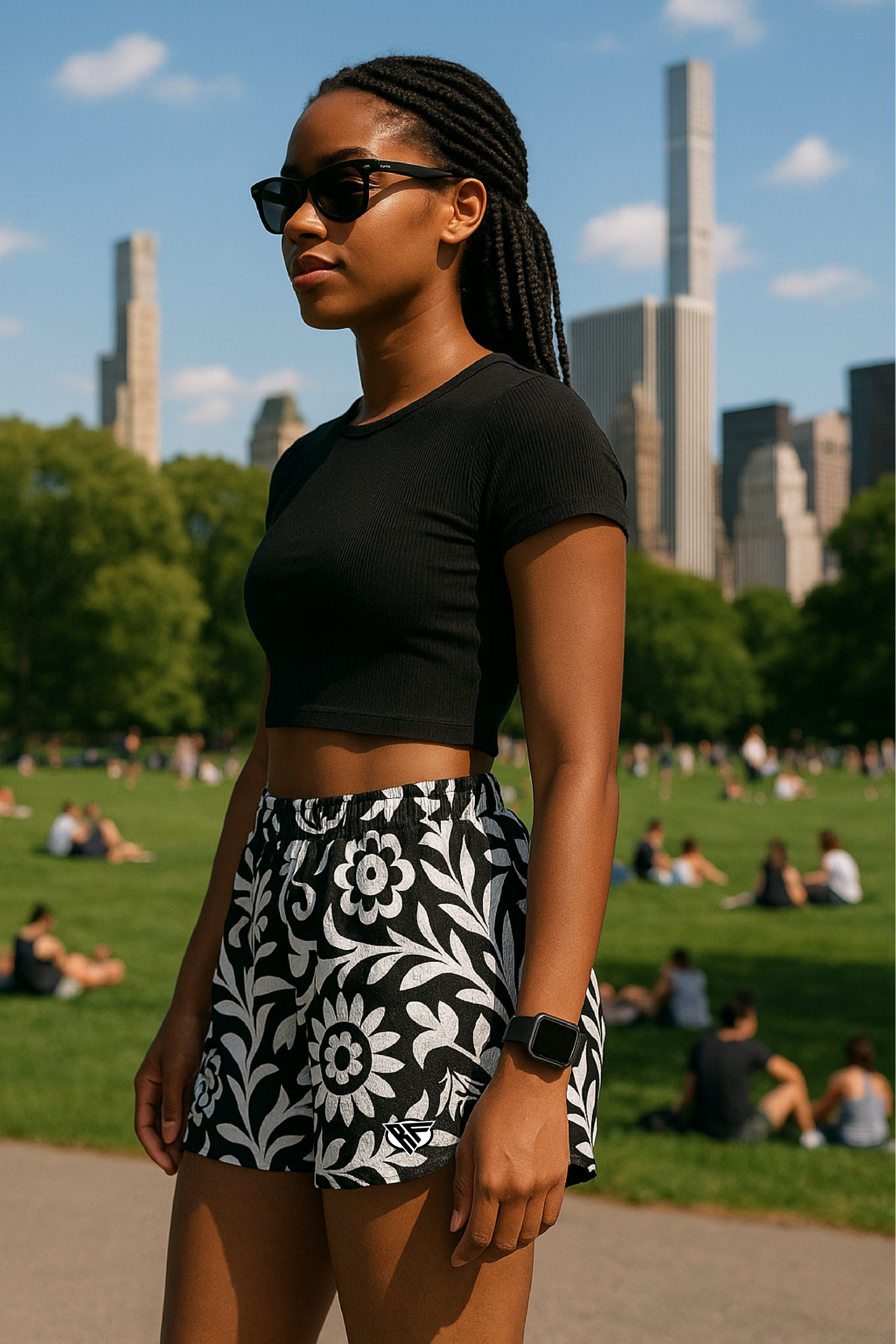 Woman at the park wearing RF-Wear Women's Paisley 2.0 Shorts - Black/White - Side View