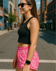 Woman standing wearing RF-Wear Women's Paisley Shorts - Fuchsia/White - Side View