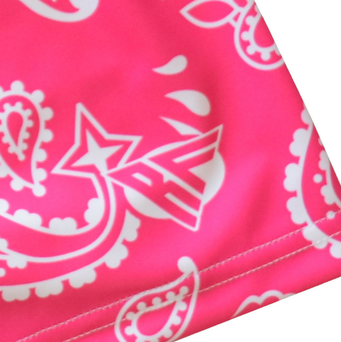 Close-up women's fuchsia/white paisley. bring with brand logo