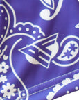 Close-up of paisley shorts in Purple/White with brand logo