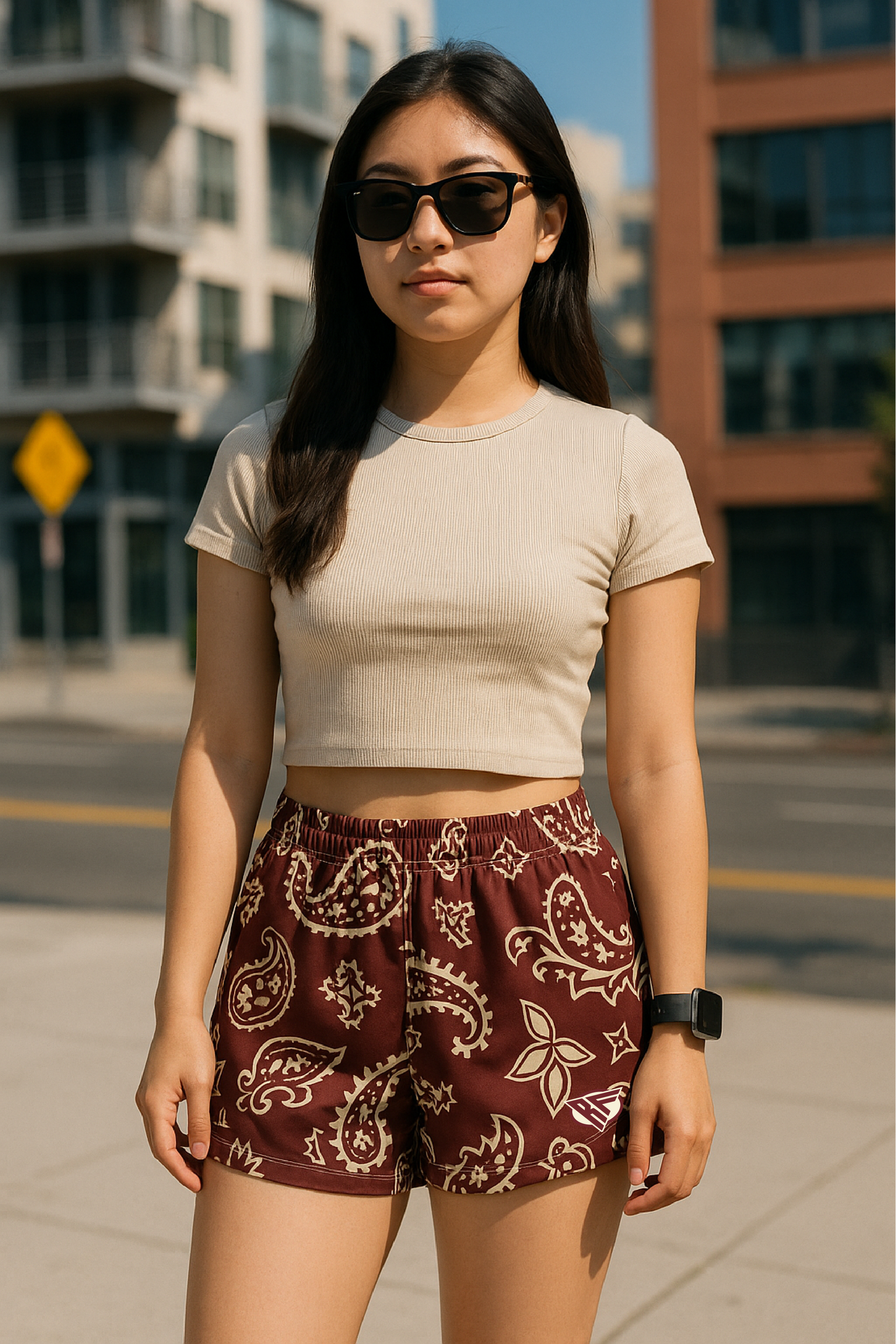 Woman standing in City wearing RF Wear Women's Paisley Shorts - Merlot/Cream - Front View