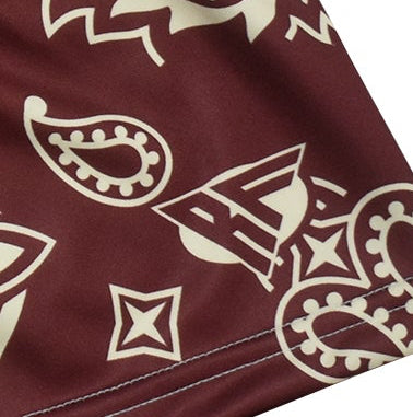 Close-up of RF-Wear Women's Paisley Shorts in Merlot/Cream with RF logo