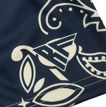 Close-up of RF-Wear Navy/Cream Paisley Shorts with brand logo