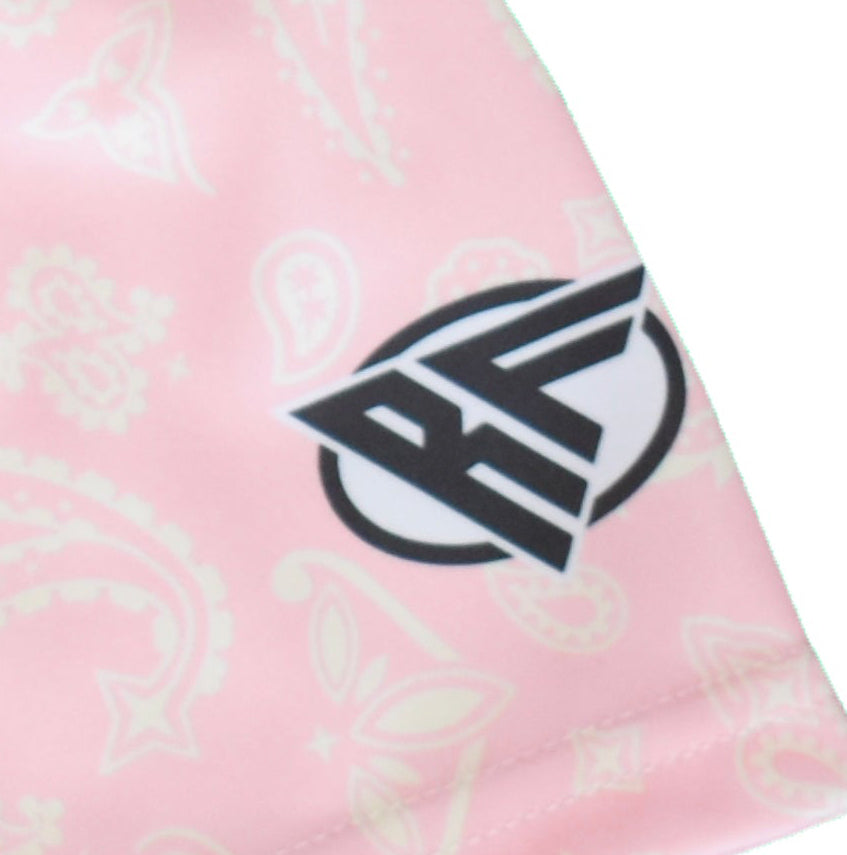 Close-up of RF-Wear women's paisley shorts in pink/cream with RF logo