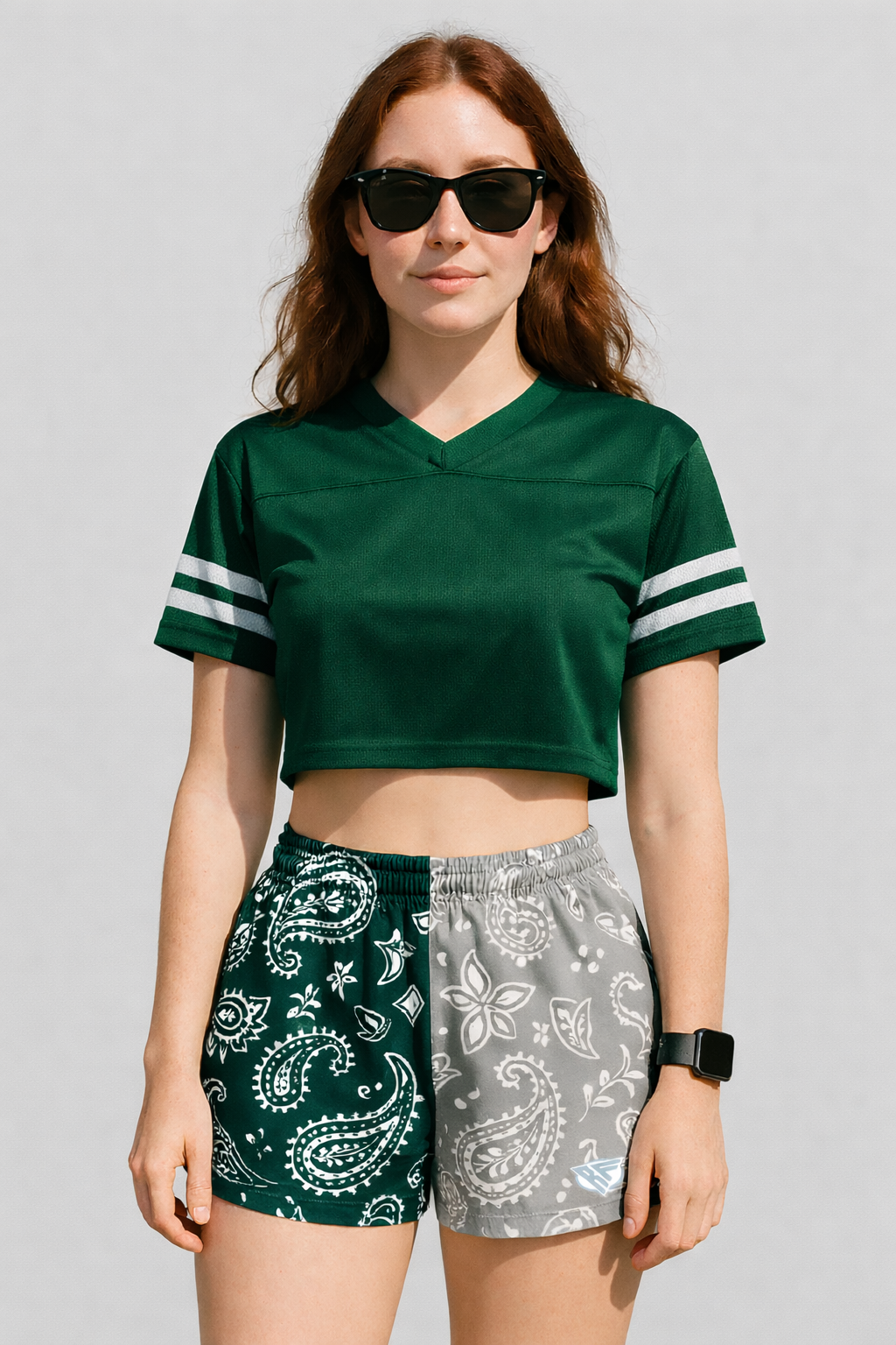 woman wearing a green top and RF-Wear Women's Split Paisley Shorts in Green/Silver