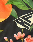 Close-up of RF-Wear Women's Peach Splash Shorts with RF logo
