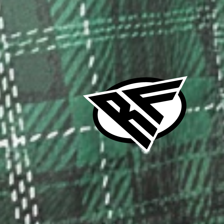 Close-up of RF-Wear Women's Plaid Shorts in Green with RF logo