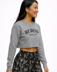 Woman wear a grey top and RF-Wear women's porcelain shorts in Black/White