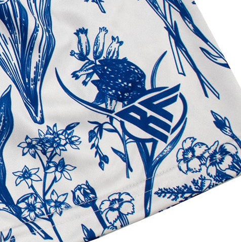 Close-up of RF-Wear Women's Porcelain Shorts in White/Blue with RF logo