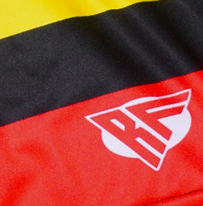 Close-up of RF-Wear Women's Rasta Shorts in Multicolors with RF logo