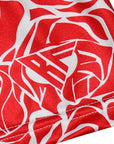 Close-up of RF-Wear Women's Rose Shorts in Red/White with RF logo