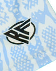 Close-up of RF-Wear women's snakeskin shorts in baby blue with RF logo