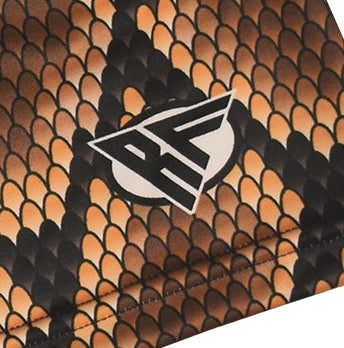 Close-up of a brown snakeskin patten with a brand logo 