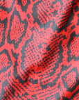 Close-Up of Women's Snakeskin Shorts in Red.