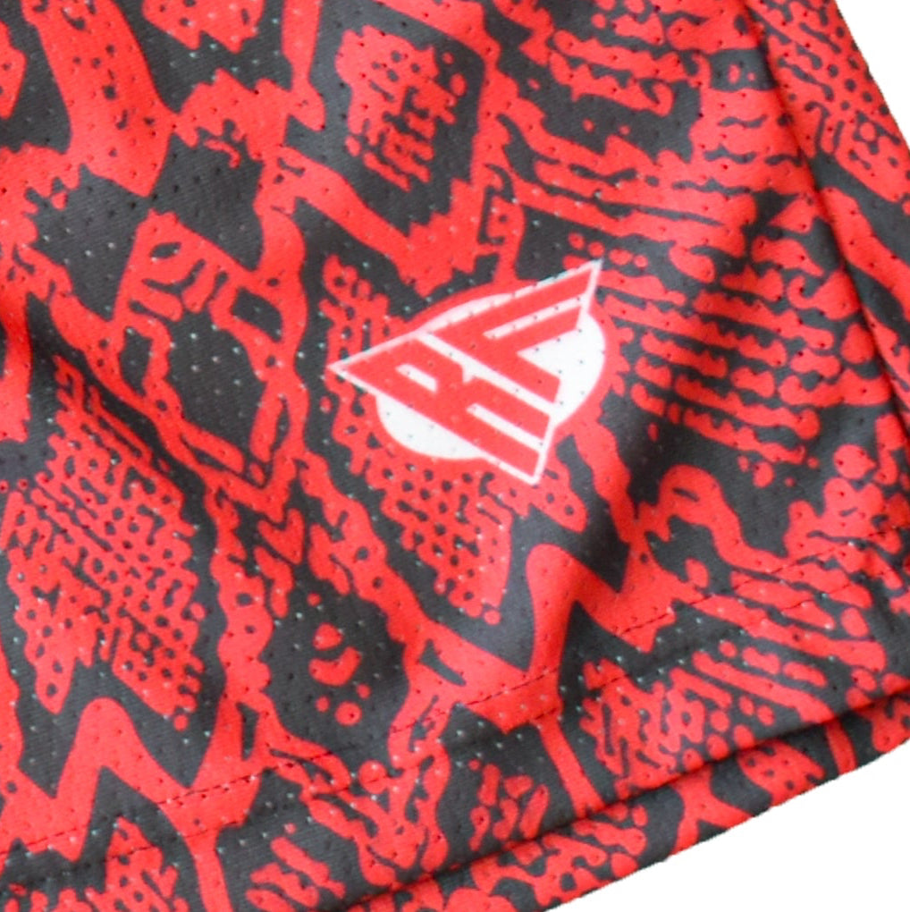 Close-Up of Women's Snakeskin Shorts in Red with RF logo