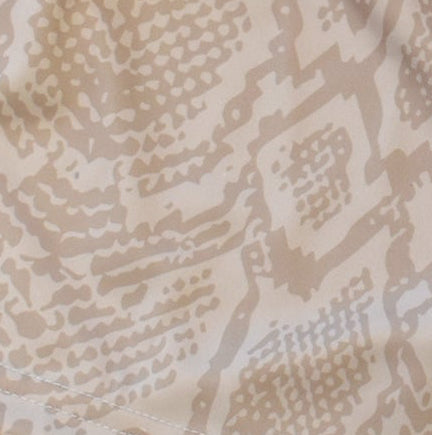 Close-up tan snakeskin shorts