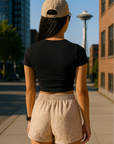 Woman wearing RF-Wear Women's Tan Snakeskin Shorts - Back View