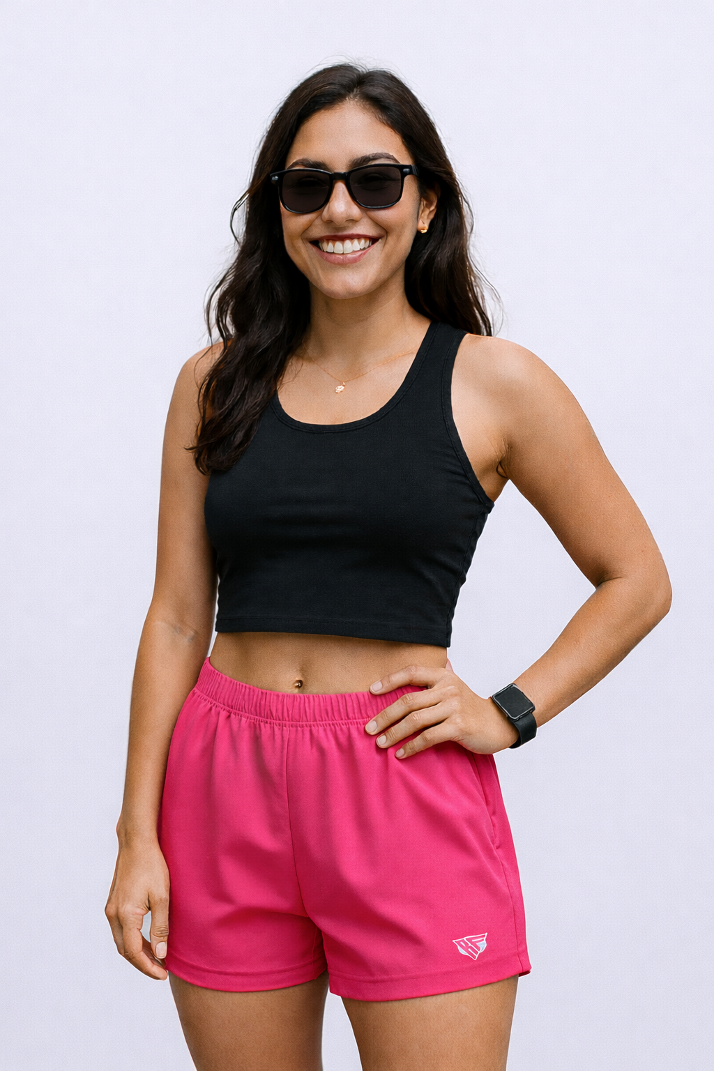 Woman Wearing a black top and RF-Wear Women's Solid Color Shorts in Fuchsia