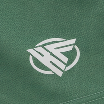 Close-up of RF-Wear Women's Solid Color Shorts in Green