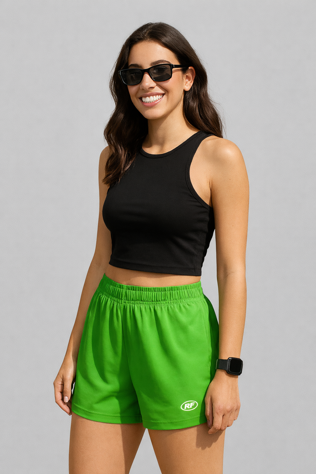 Woman Wearing a black top and RF-Wear Women's Solid Color Shorts in Lime-Green