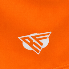 Close-up of RF-Wear Women's Solid Color Shorts in Orange with RF logo
