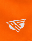 Close-up of RF-Wear Women's Solid Color Shorts in Orange with RF logo