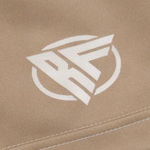 Close-up of RF-Wear Womens Solid Color Shorts in Tan with RF logo